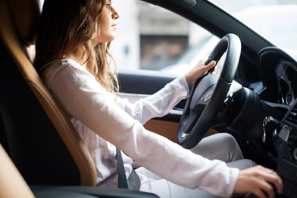 image of a driver with safety belt depicting safe driving distance.jpg