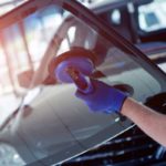 image of windshield replacement in an auto glass shop