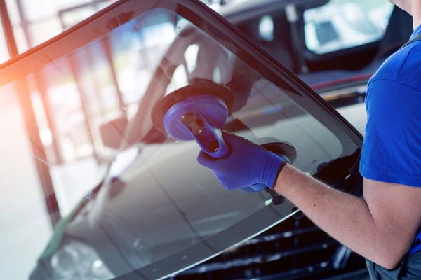 image of windshield replacement in an auto glass shop