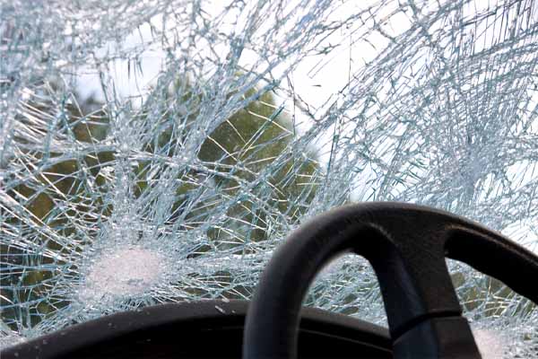 image of a broken windshield after a car accident