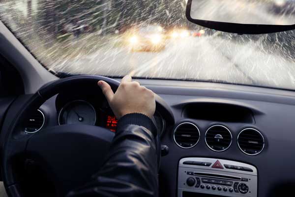 image of a driver in winter depicting windshield winter care