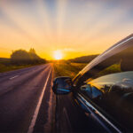 driving in summer depicting windshield repair service