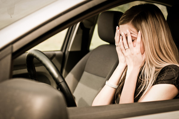 woman with a leaky windshield