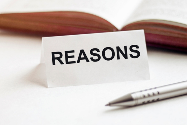reasons written on a tent card depicting Windshield Chip Repairs Failure