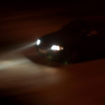 car driving with foggy headlights