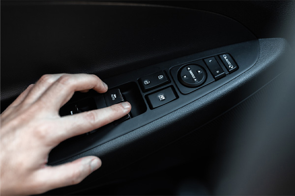 image of opening car window after a windscreen replacement