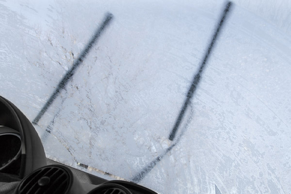 windshield wipers frozen on windshield in winter