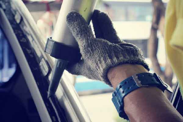 image of a windshield replacement by a certified auto glass technician