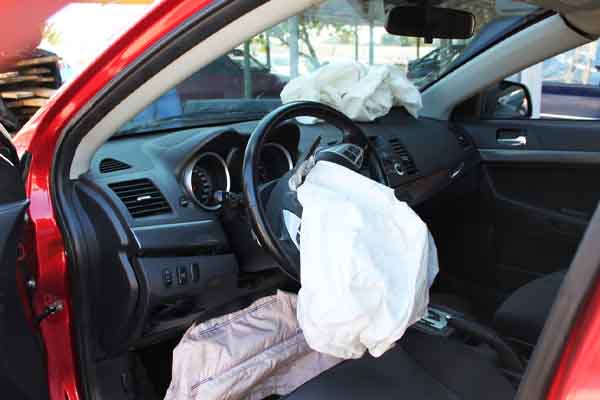 image of airbag deployment depciting airbags and windshield replacement