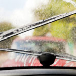 driving in the rain depicting squeaky windshield wipers