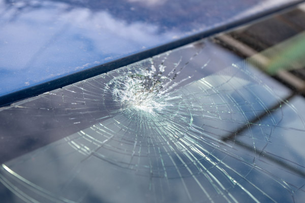 image of rock damage depicting pick up truck windshield repair