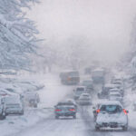 image of cars in harsh winter driving conditions