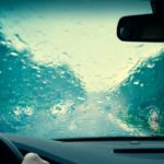 water on windshield depicting leaky windshield