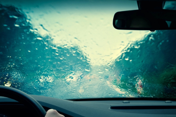 water on windshield depicting leaky windshield