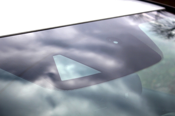 cameras and other sensors installed on windshield depicting Advanced Driver Assistance Systems (ADAS)